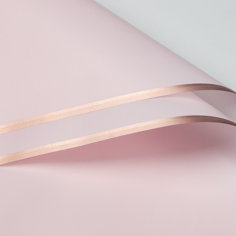Papier cadeau fleur mat bordé d'or