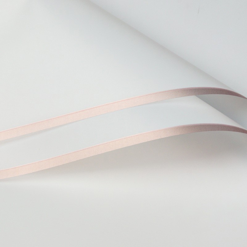 Papier cadeau fleur mat bordé d'or