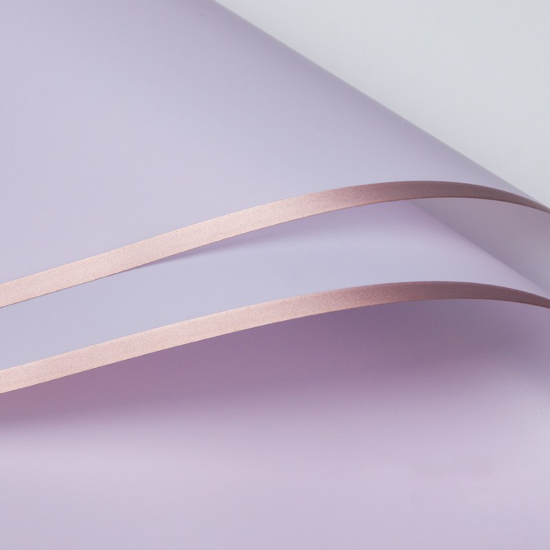 Papier cadeau fleur mat bordé d'or