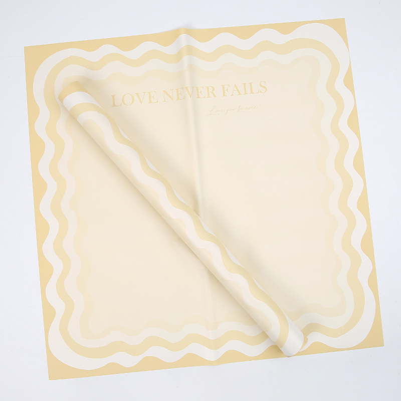 Papier d'emballage de fleurs solides avec bord ondulé