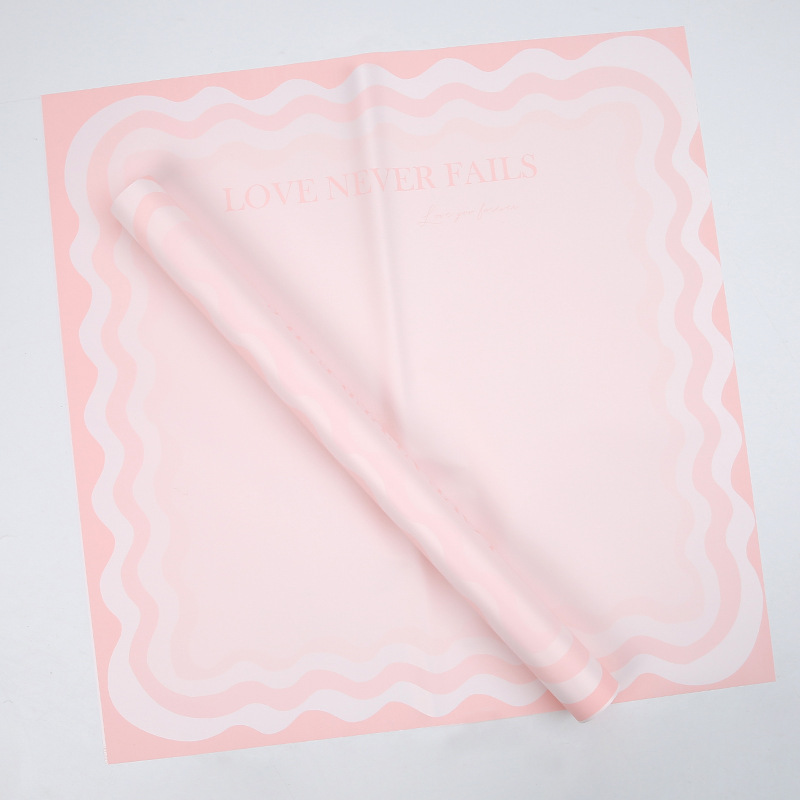 Papier d'emballage de fleurs solides avec bord ondulé