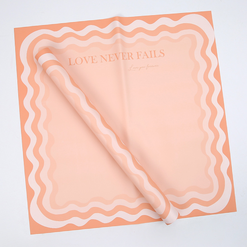 Papier d'emballage de fleurs solides avec bord ondulé