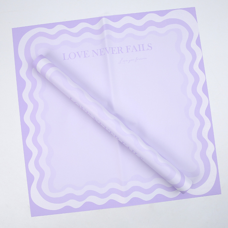 Papier d'emballage de fleurs solides avec bord ondulé
