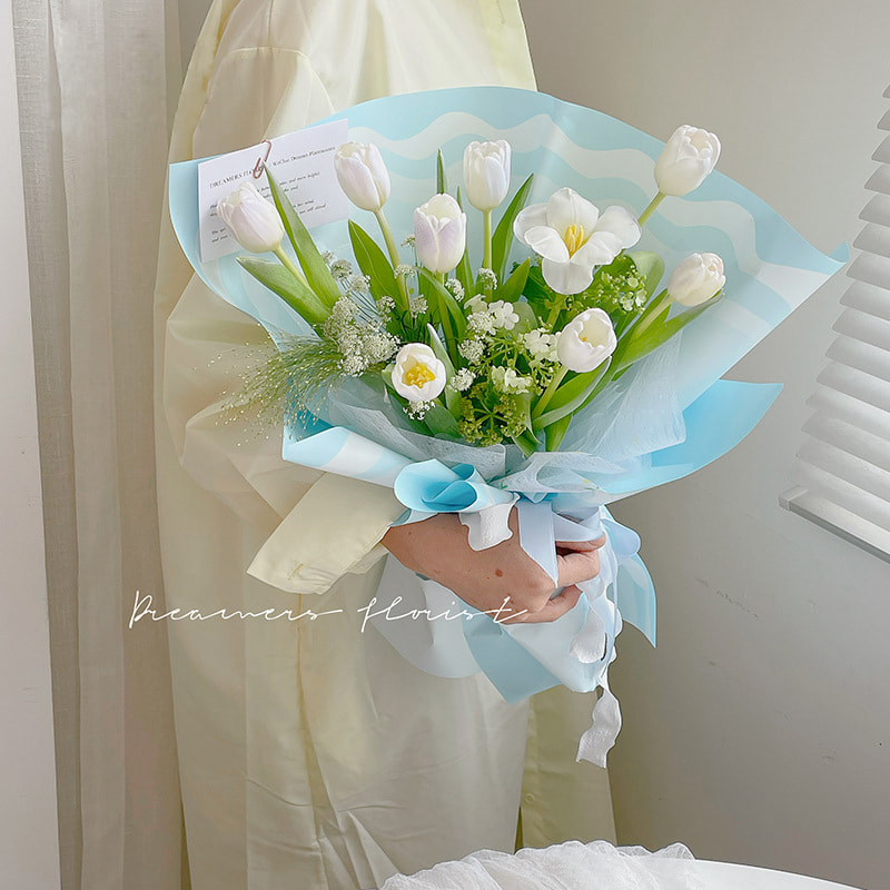Papier d'emballage de fleurs solides avec bord ondulé