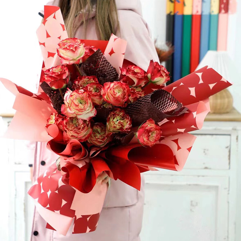 Papier cadeau fleur à pois bicolore