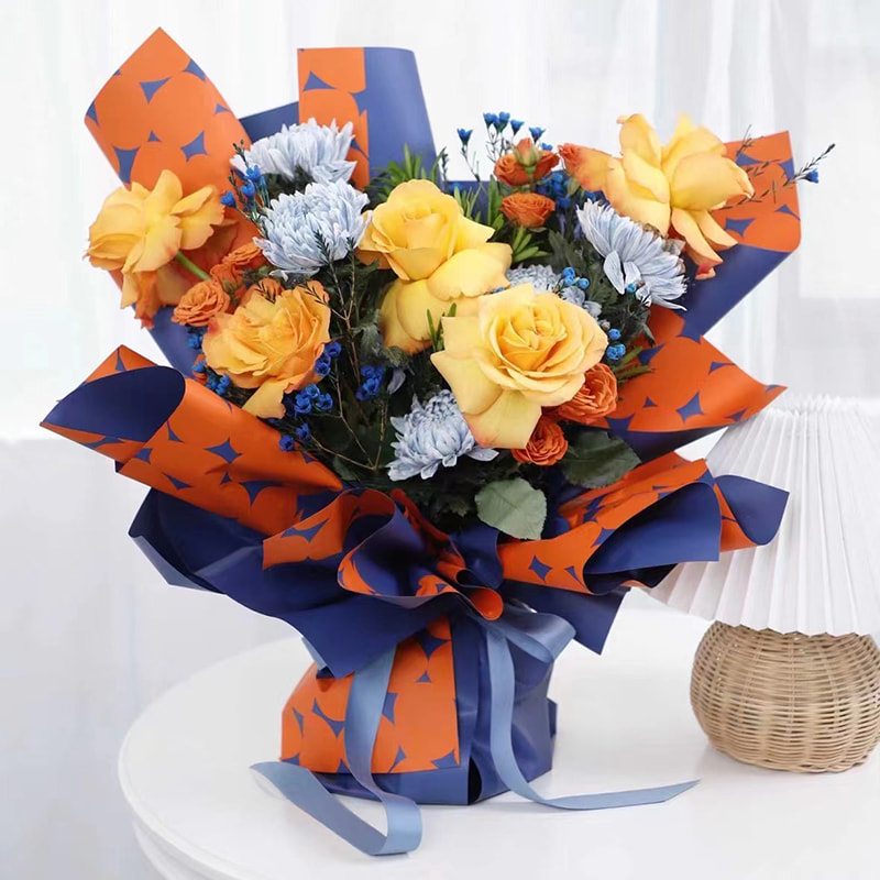 Papier cadeau fleur à pois bicolore