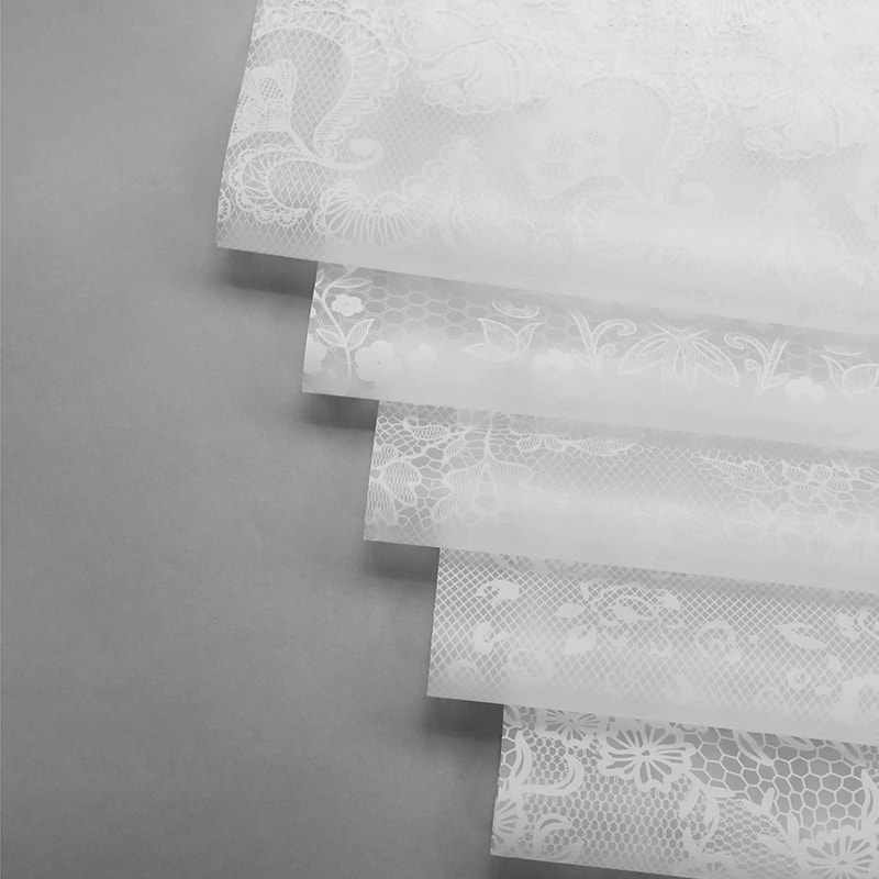 Papier d'emballage de fleurs Nuosha dans différents motifs et styles