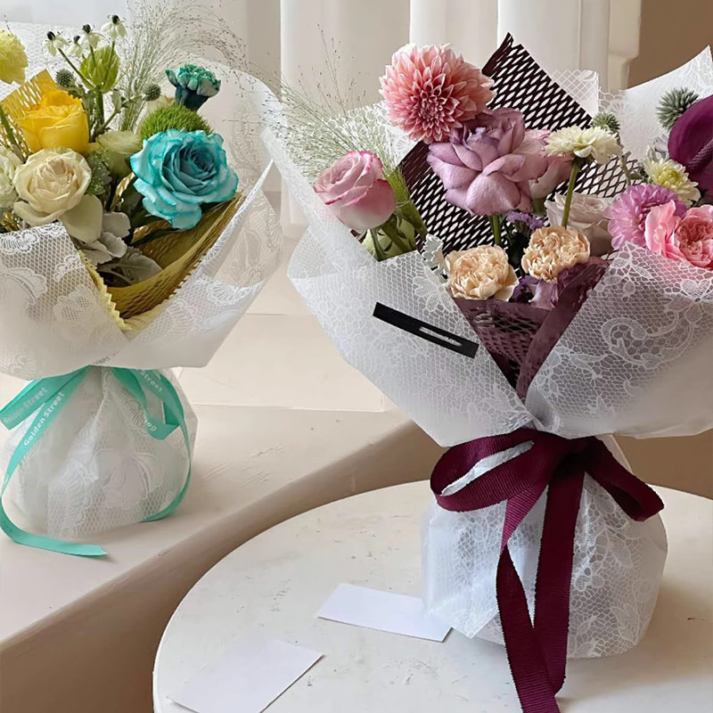 Papier d'emballage de fleurs Nuosha dans différents motifs et styles