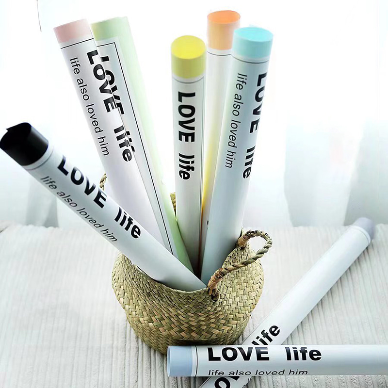 Papier d'emballage de fleurs aux lettres lisses